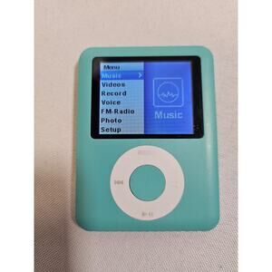 2 GB Fm MP3 / MP4 Ns-302 Teal MP3/Video/FM Radio Player